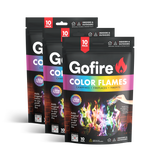 Three packets of Gofire Color Flames fire starters, with vibrant flames depicted on the packaging, indicating the product is designed to add color to fires.